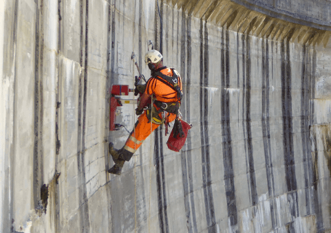 Abseil Access team performing a concrete inspection.